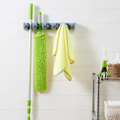 Wall Mount Broom and Mop Holder, Gray Plastic Tool Organizer With Slots and Hooks for Garage, Laundry, or Kitchen